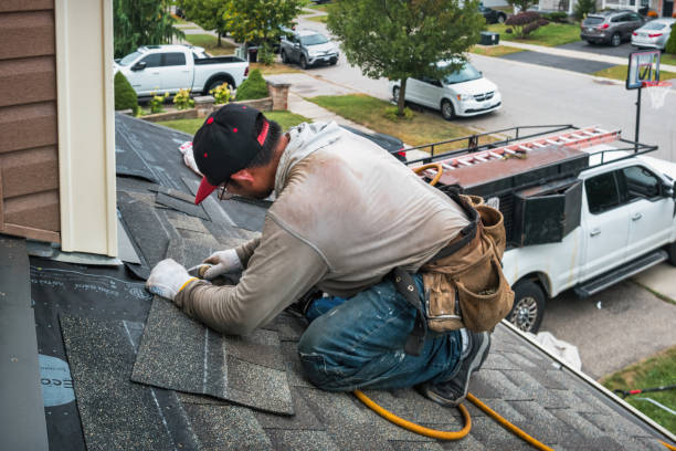 Professional Roof Leak Repair technician working in Augusta, IL